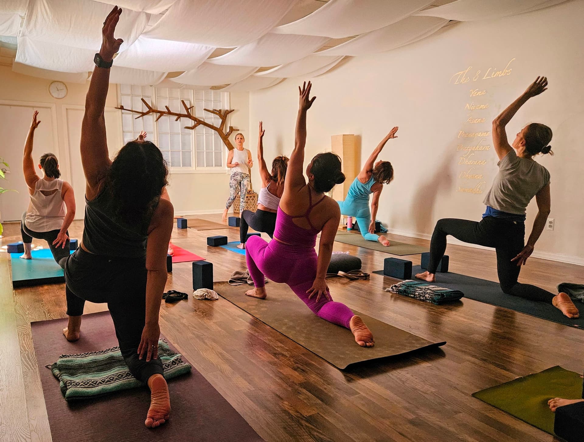 Oyster Bay Yoga May newsletter highlights Mermaid Pose and summer ease