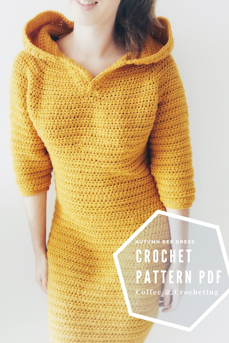 Oversized crochet sweater dress with hood blends comfort and texture