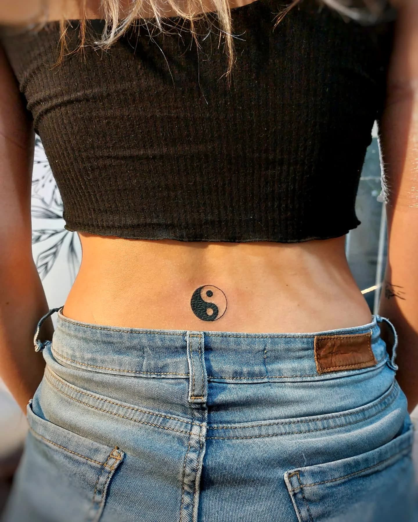 Jerwood gallery reimagines yin yang tattoos with animals, moons, and symmetry