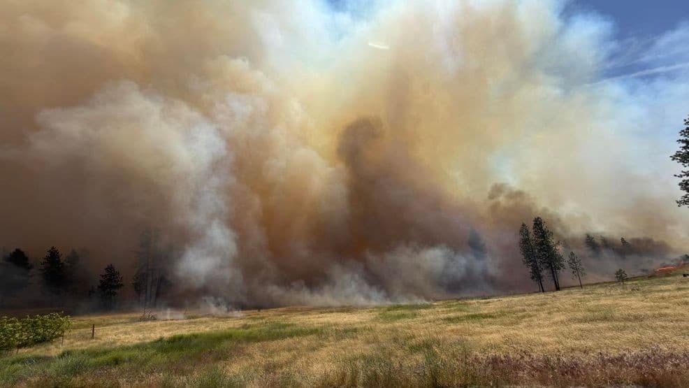 Washington wildfire forces mass evacuations as possible remains found