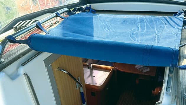 Simple companionway cover keeps cabins dry and private