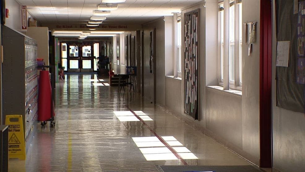 Heavy rain floods Oak Harbor streets, school corridor and private lots