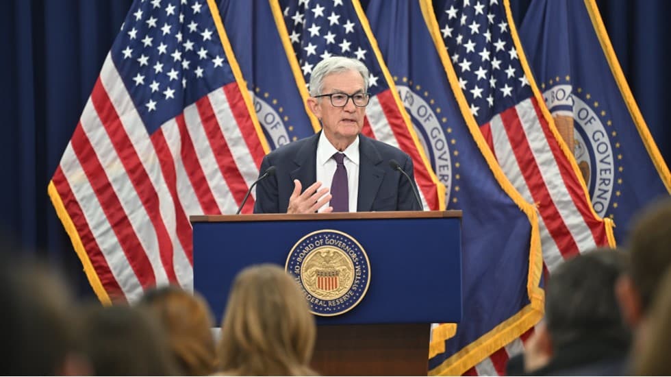 Fed Holds Rates Steady at 3.50%-3.75%, Upgrades Growth and Inflation Forecasts