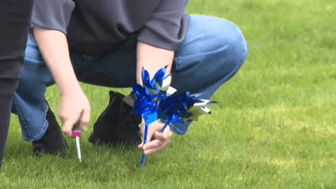Kids FIRST Plants Blue Pinwheels, Marks Child Abuse Prevention Month in Eugene