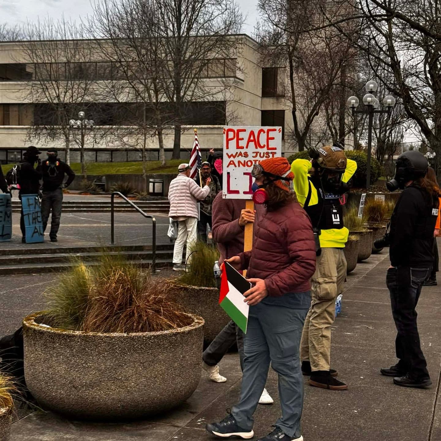 Driver, Protester Hurt After Black Bloc Blocks Downtown Eugene Intersection