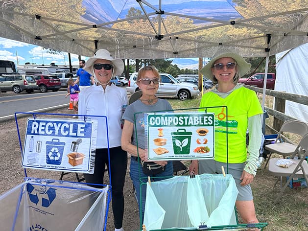 Volunteers sort waste at Jemez Mountain Trail Run finish line