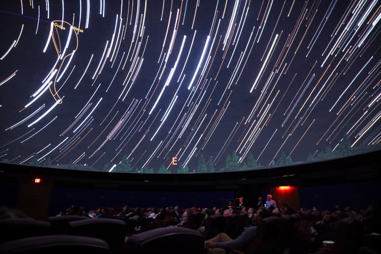 UNC chapel hill schedules Yoga Under the Stars at planetarium