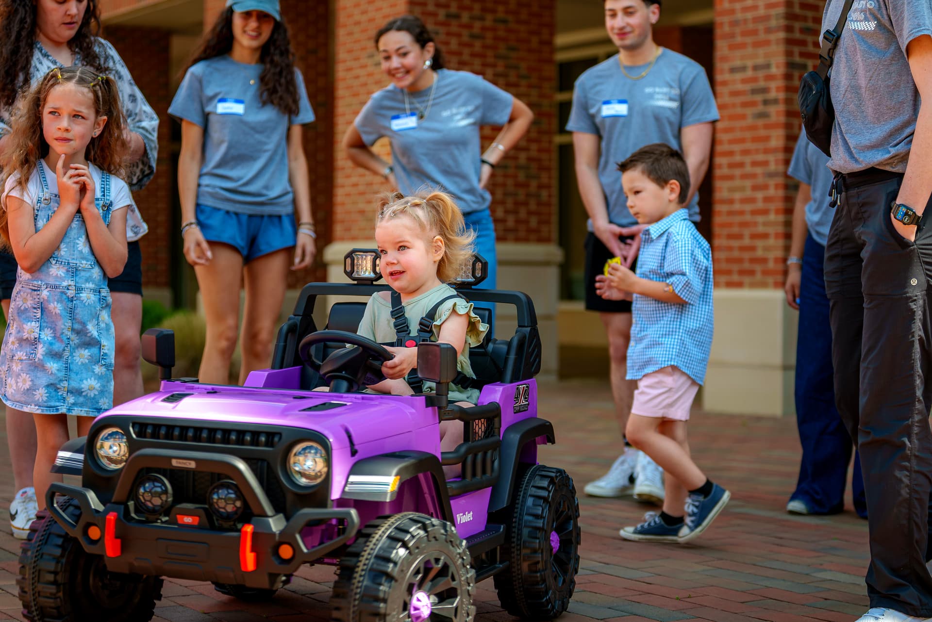 Elon students help Piedmont Triad children with mobility disabilities drive toy cars