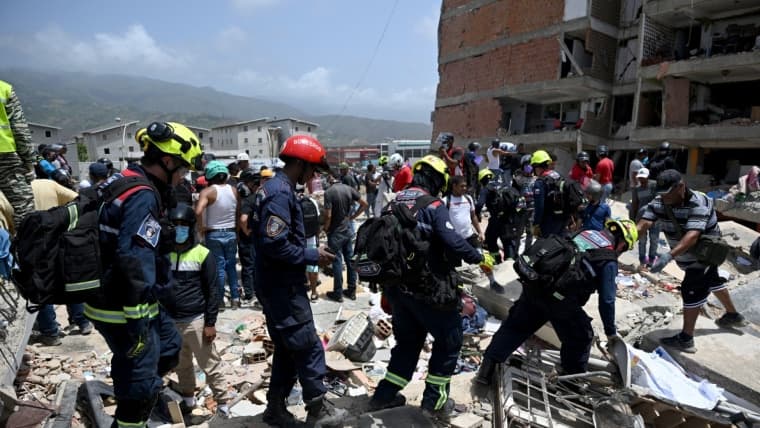 Rescuers free trapped Venezuelan family after twin earthquakes in La Guaira