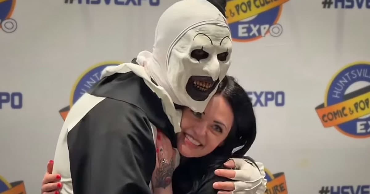 Terrifier star David Howard Thornton proposes in full Art the Clown costume