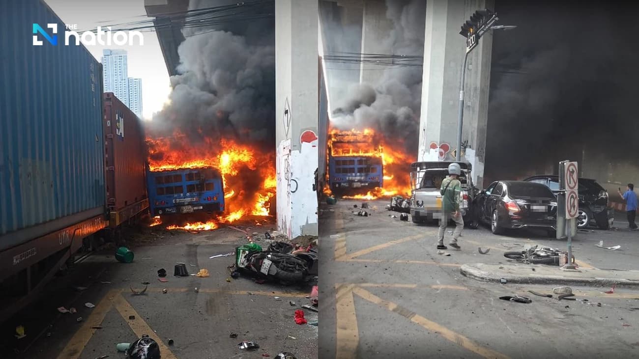 Freight train slams bus in Bangkok, killing 8 and injuring dozens