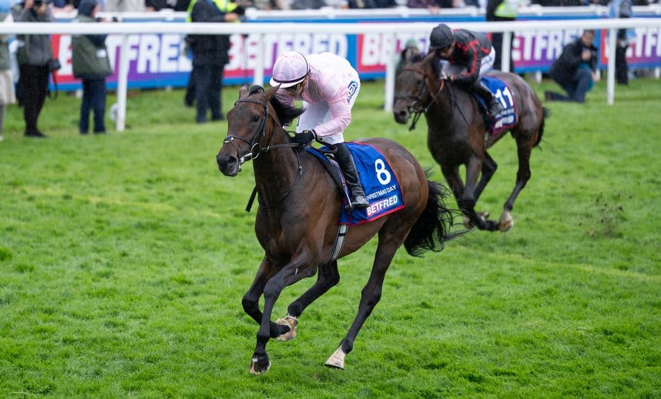 Christmas Day powers through mud to land O’Brien’s 12th Derby crown