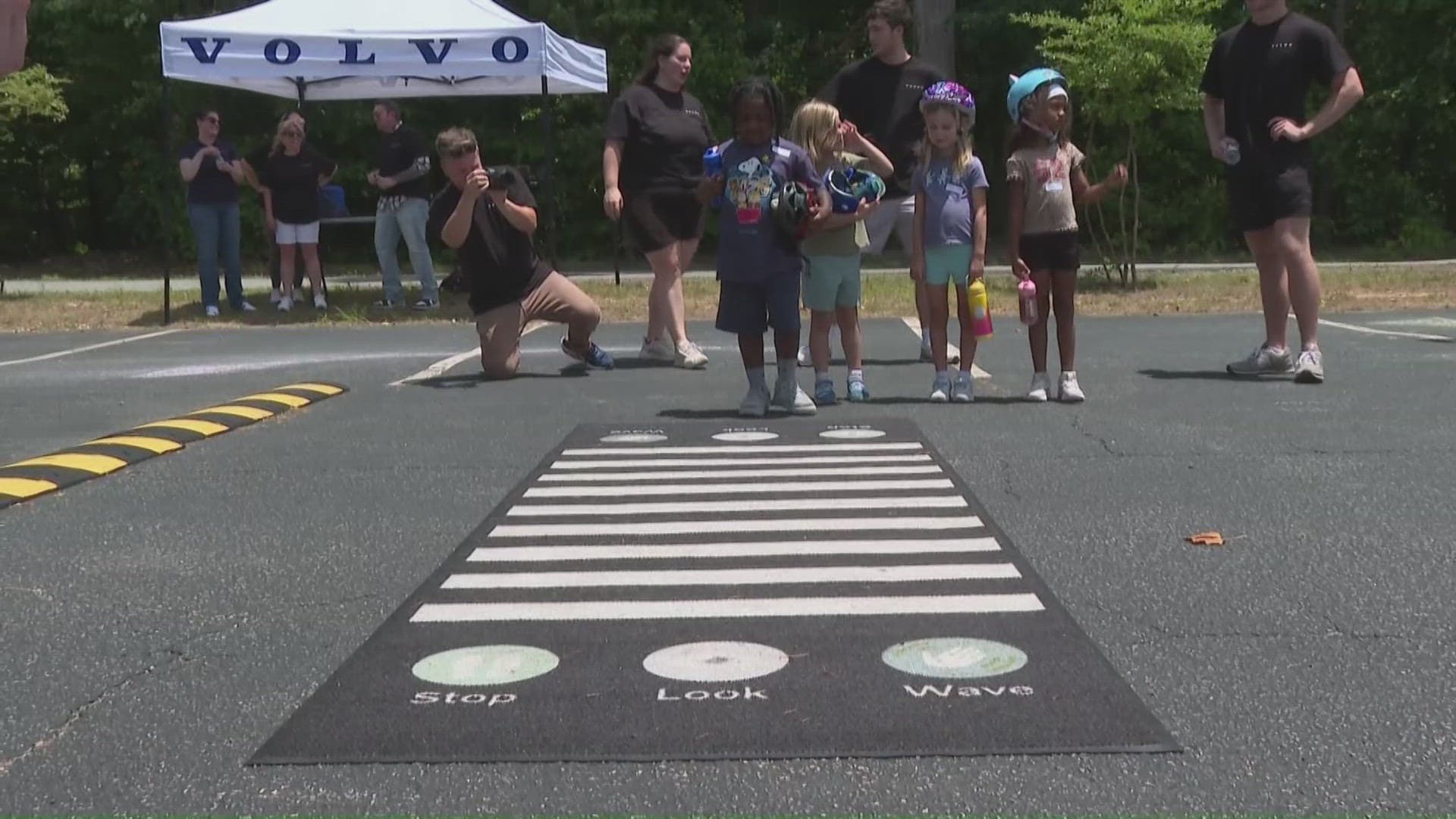 Volvo teaches Greensboro children street safety in Safety Town program