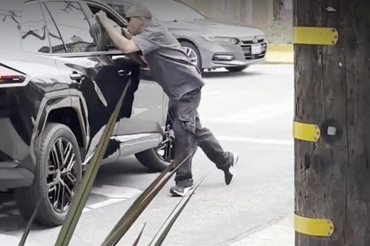 Man seen dangling from SUV during violent San Francisco road rage incident