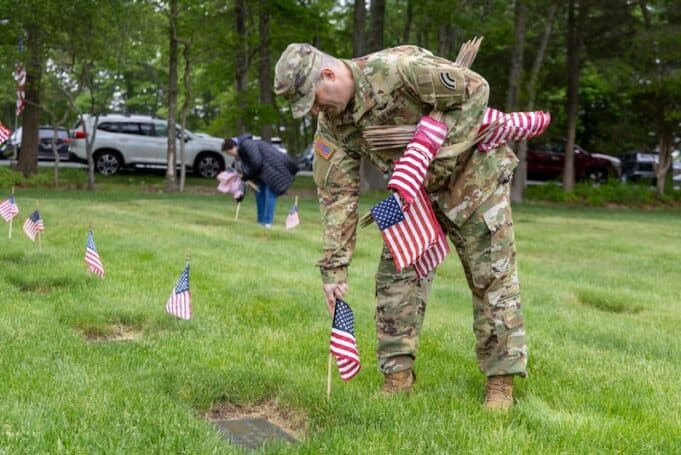 Nearly 5,000 volunteers place flags at Calverton cemetery for Memorial Day