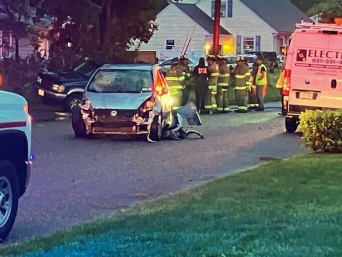 Riverhead woman charged after hitting five parked cars, house