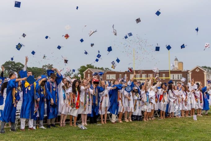 Riverhead High School class of 2026 graduates at McKillop Field