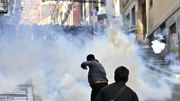 Protests and blockades trap Bolivia’s capital as Paz faces crisis