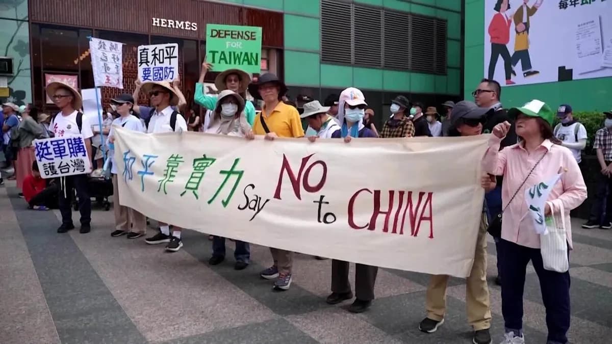 Taipei protesters decry cuts to Taiwan's defense spending plan