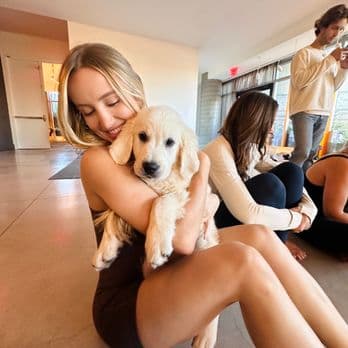 Garden City puppy yoga invites toddlers for play and beginner poses