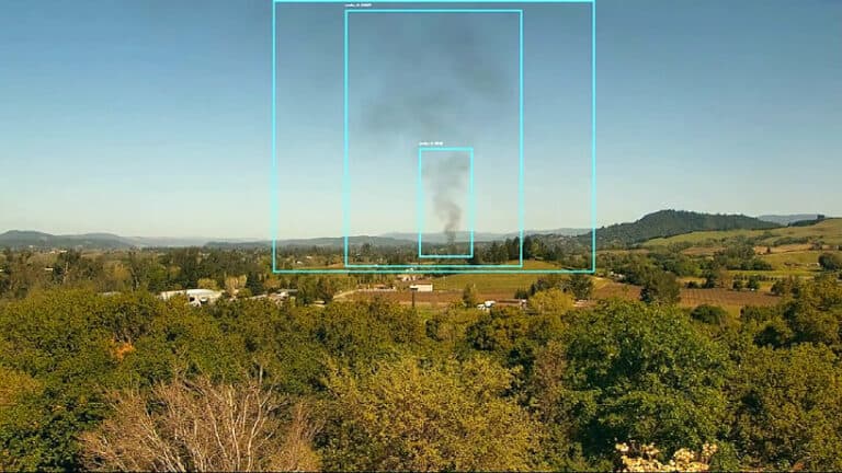 AI Camera Alerts Contain Wildfire Near Turtle Mountain, Protecting Douglas County