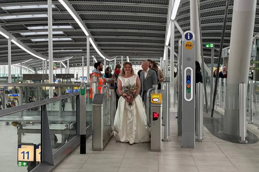 Dutch Bride Chooses Thrifted Gown for Eco-Conscious Station Wedding