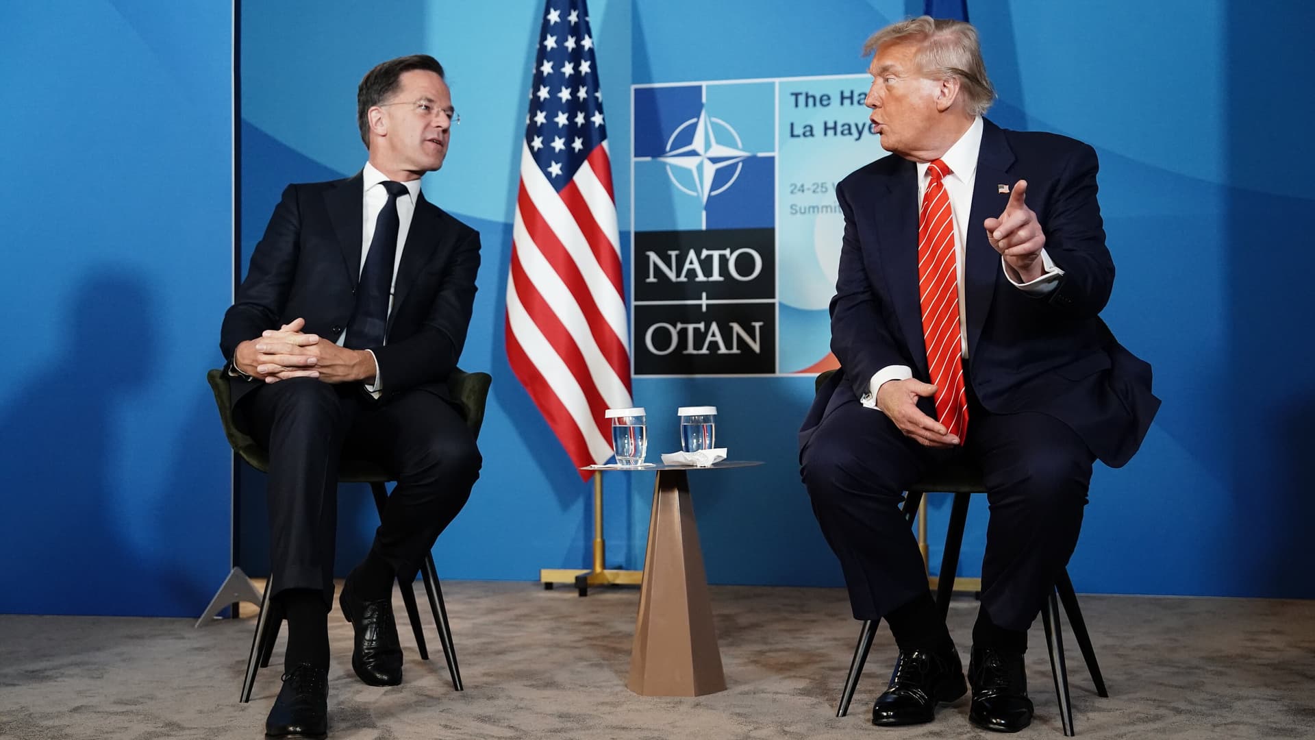 Trump assails NATO allies over spending, then praises summit unity