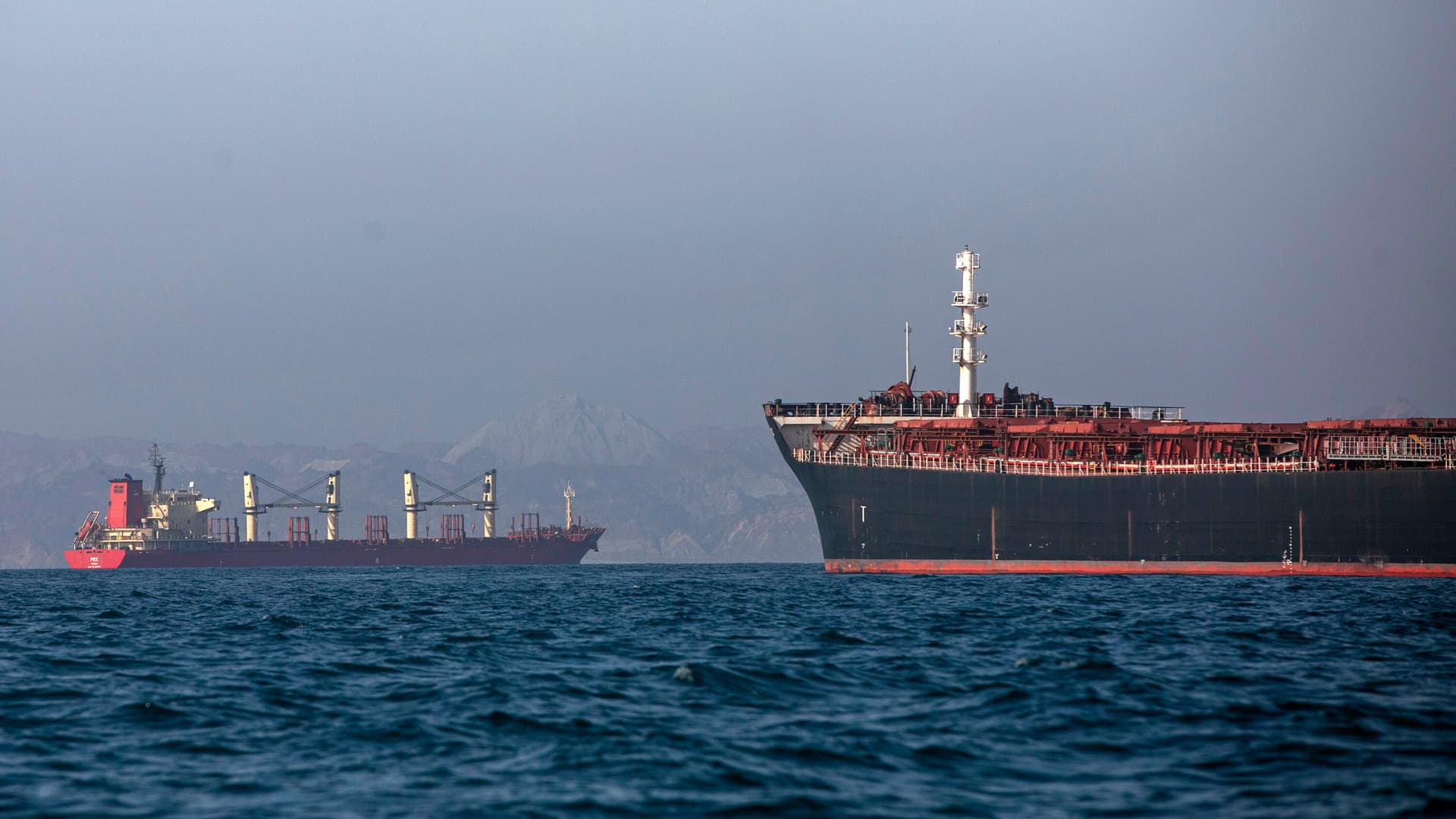 Iran says it is closing Strait of Hormuz again as ships pass through