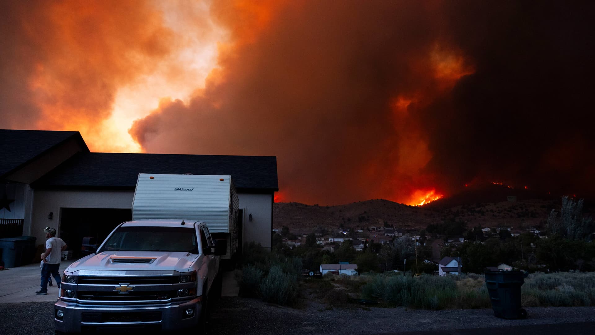Extreme heat and winds fuel major wildfires across western states