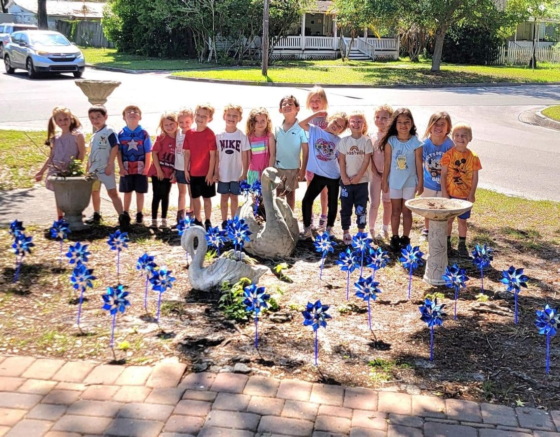 Sanford preschool creates pinwheel garden for Child Abuse Awareness Month
