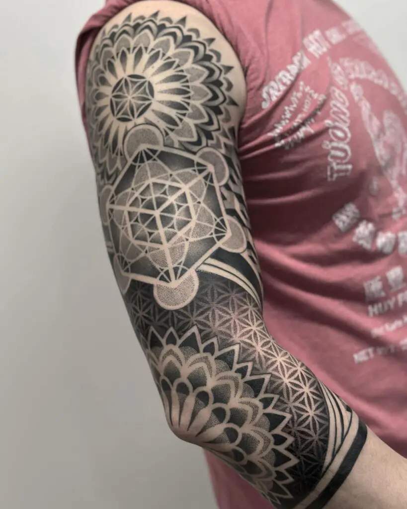 Geometric sleeve tattoos demand careful planning, symmetry, and expert design