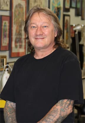 Legendary rock tattoo artist Greg James dies at 71