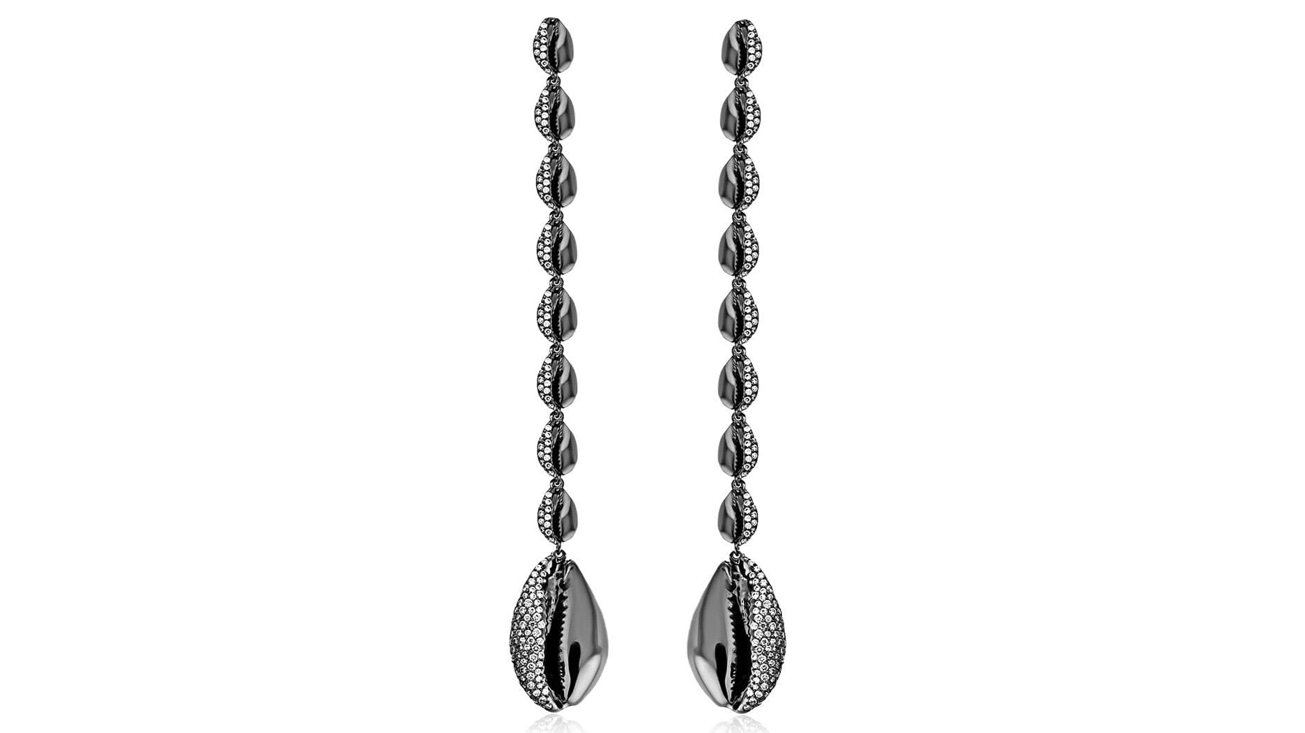 Michelle Obama portrait spotlights Almasika cowrie-shell earrings and heritage