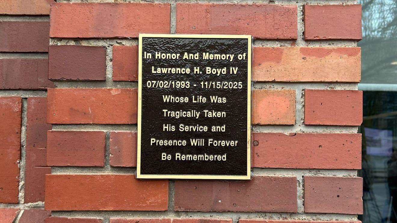 Memorial plaque honors slain Traverse City parking worker downtown