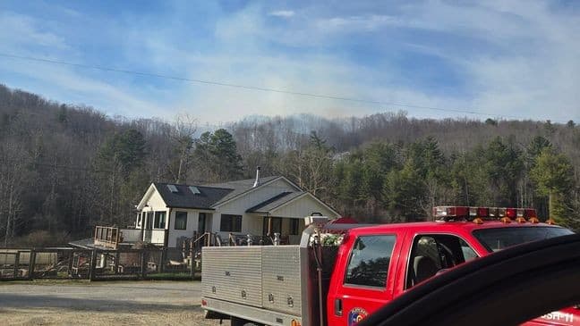 Man charged after pickup strikes parked cars, poles in downtown Asheville