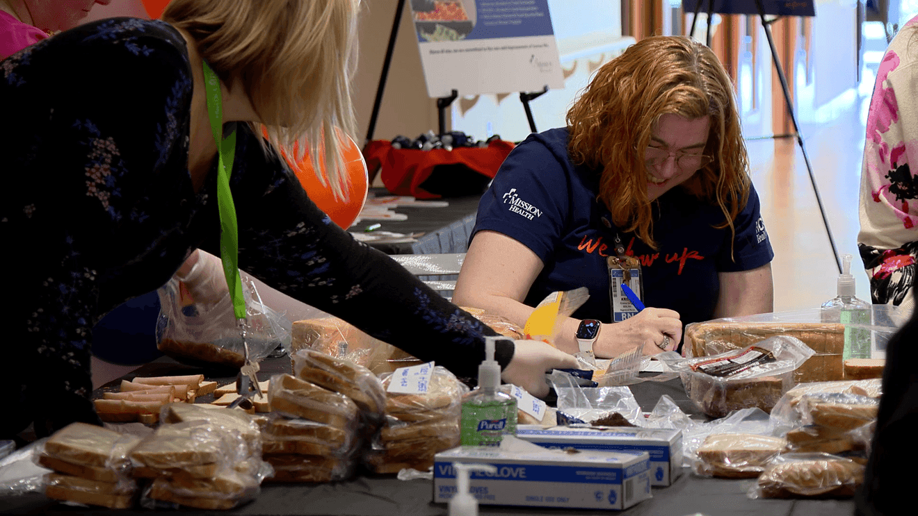 Mission Hospital volunteers make sandwiches for Asheville food nonprofit