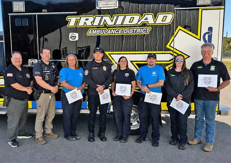 Trinidad ambulance crew honored for rescuing three from house fire