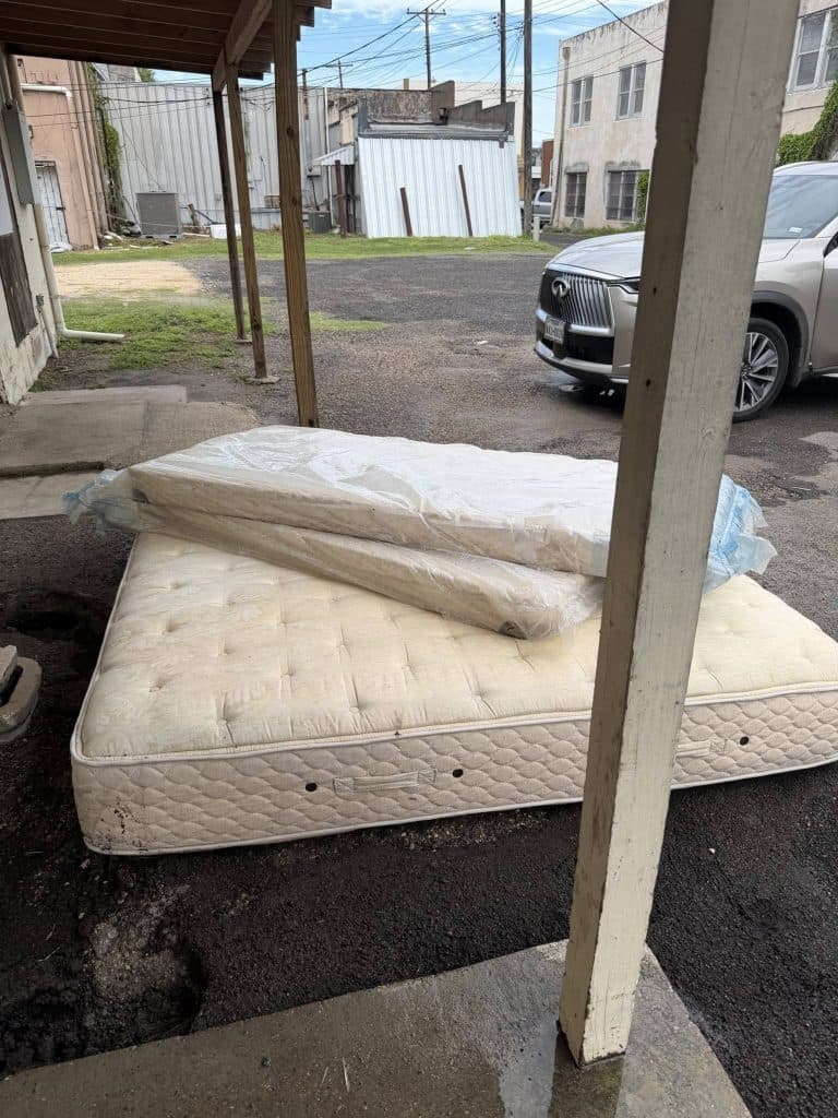 Illegal dumping behind Alice shop causes flooding, threatens pantry funding