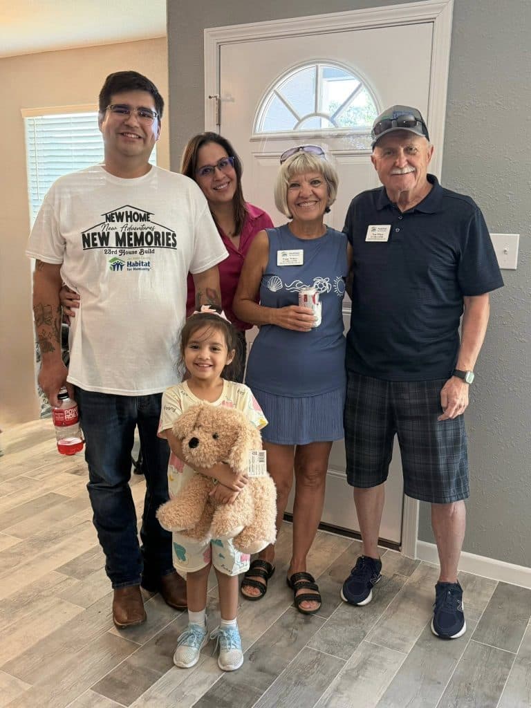Alice father, daughter receive keys to Habitat for Humanity home
