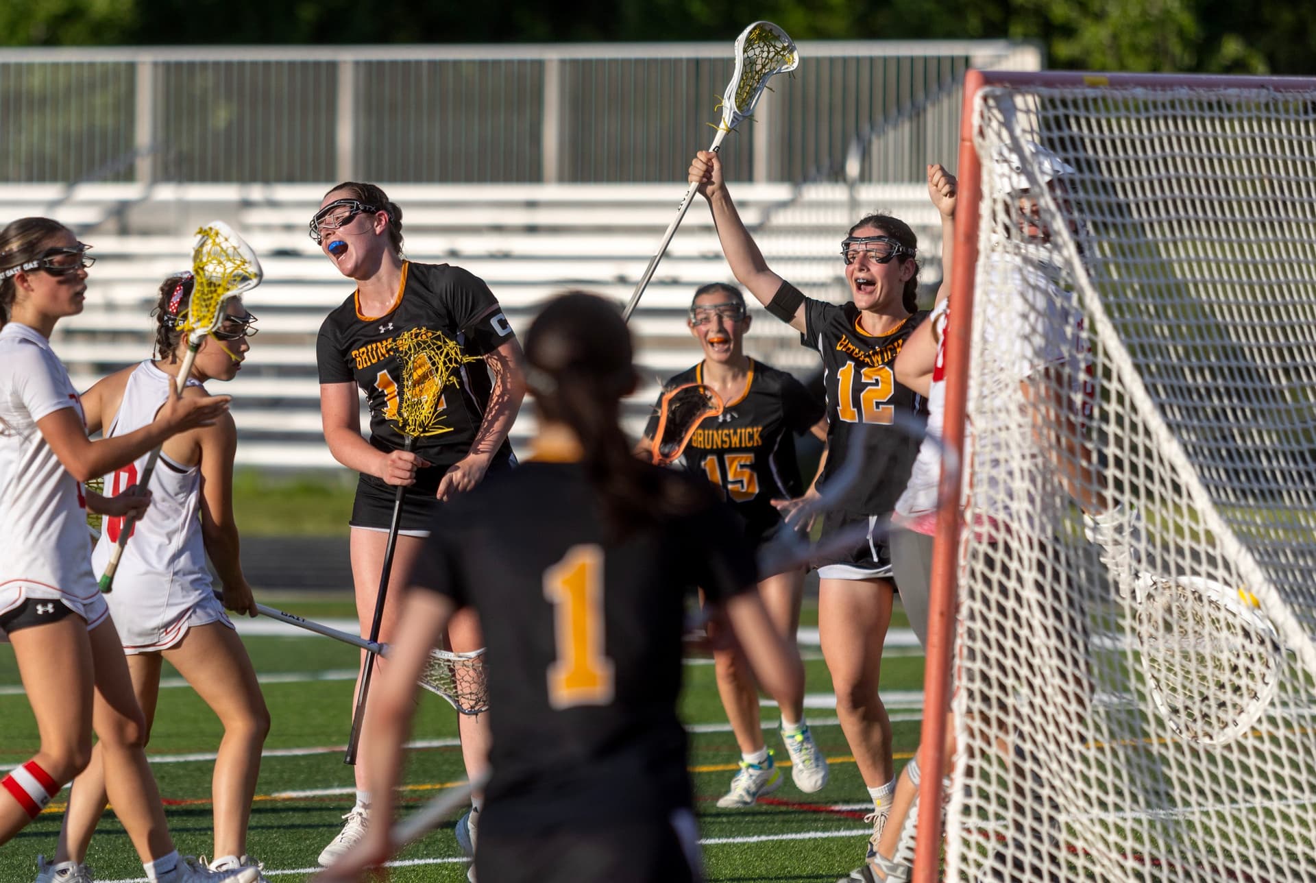 Brunswick girls lacrosse outlasts Cony in weather-delayed quarterfinal
