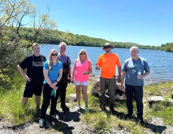 Volunteers remove 30 cubic yards of trash from Walton Lake