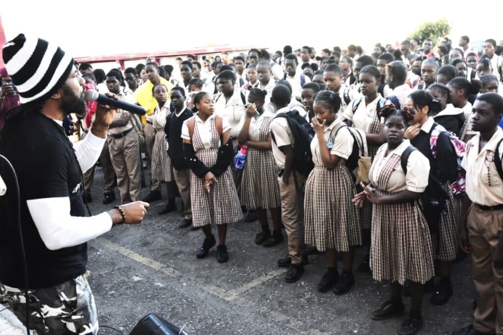 Hezron Clarke Takes Anti-Violence Save the Children Tour Islandwide
