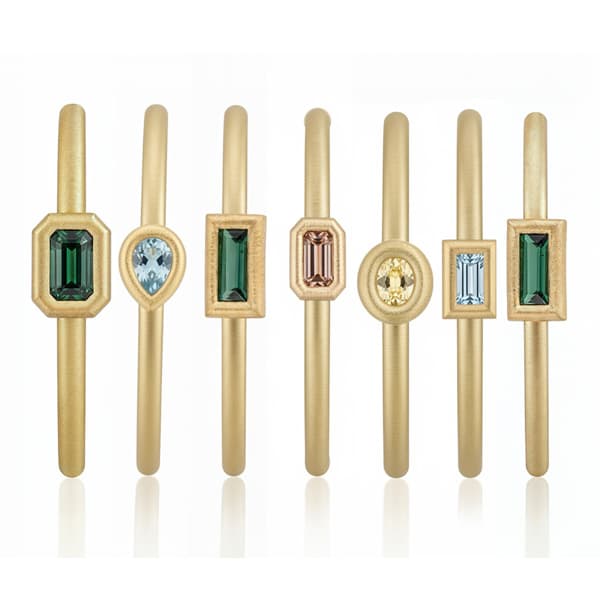 Stacked bangles and rings return as jewelry’s bold layering trend