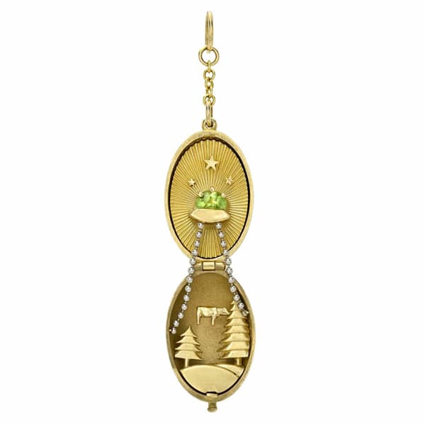 Kimberly Doyle’s kinetic pendant turns ’90s UFO memories into gold art