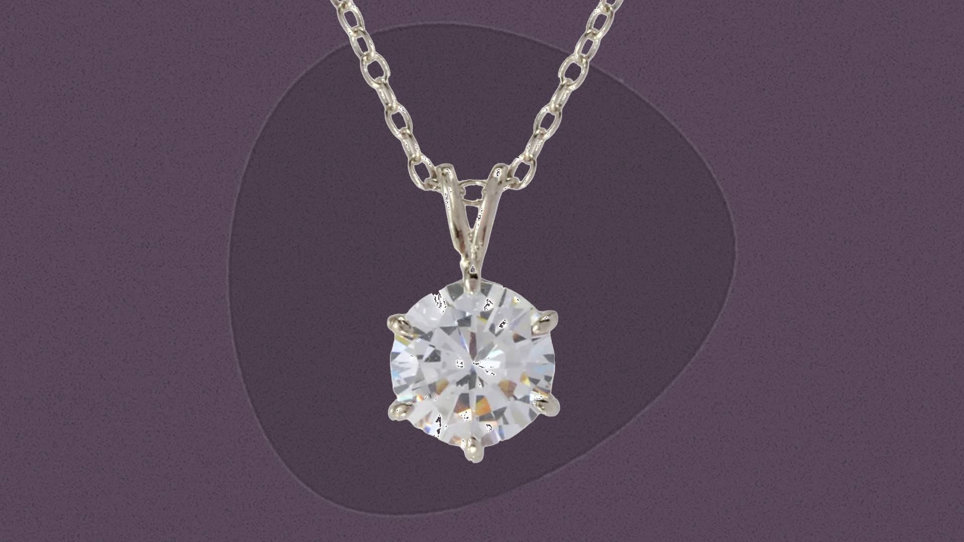 Minimalist solitaire pendant shines as a timeless push-present gift