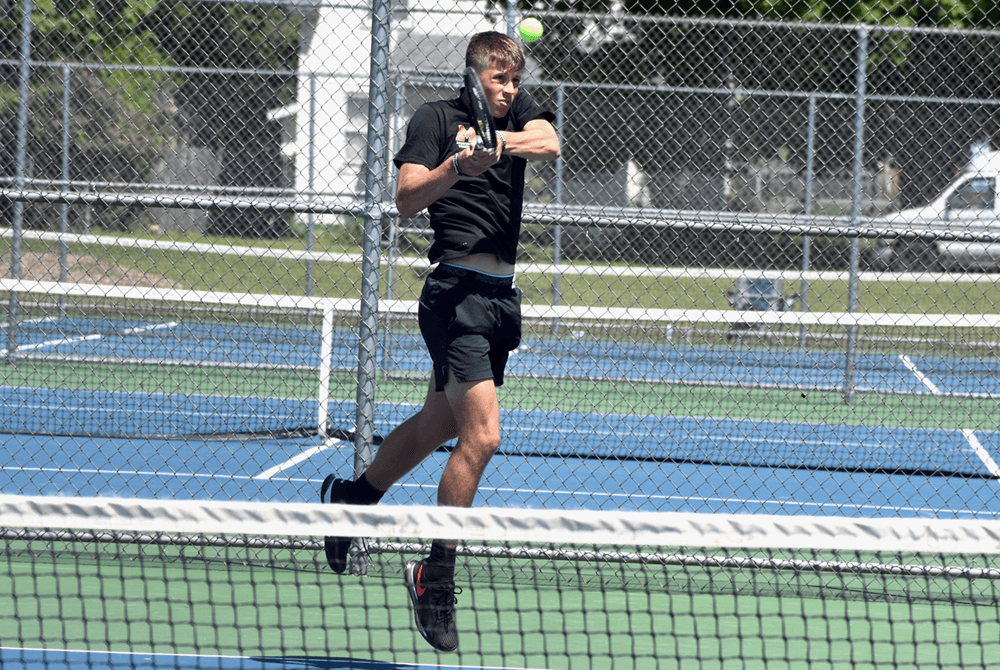 West Iron County boys tennis stays in chase after split matches