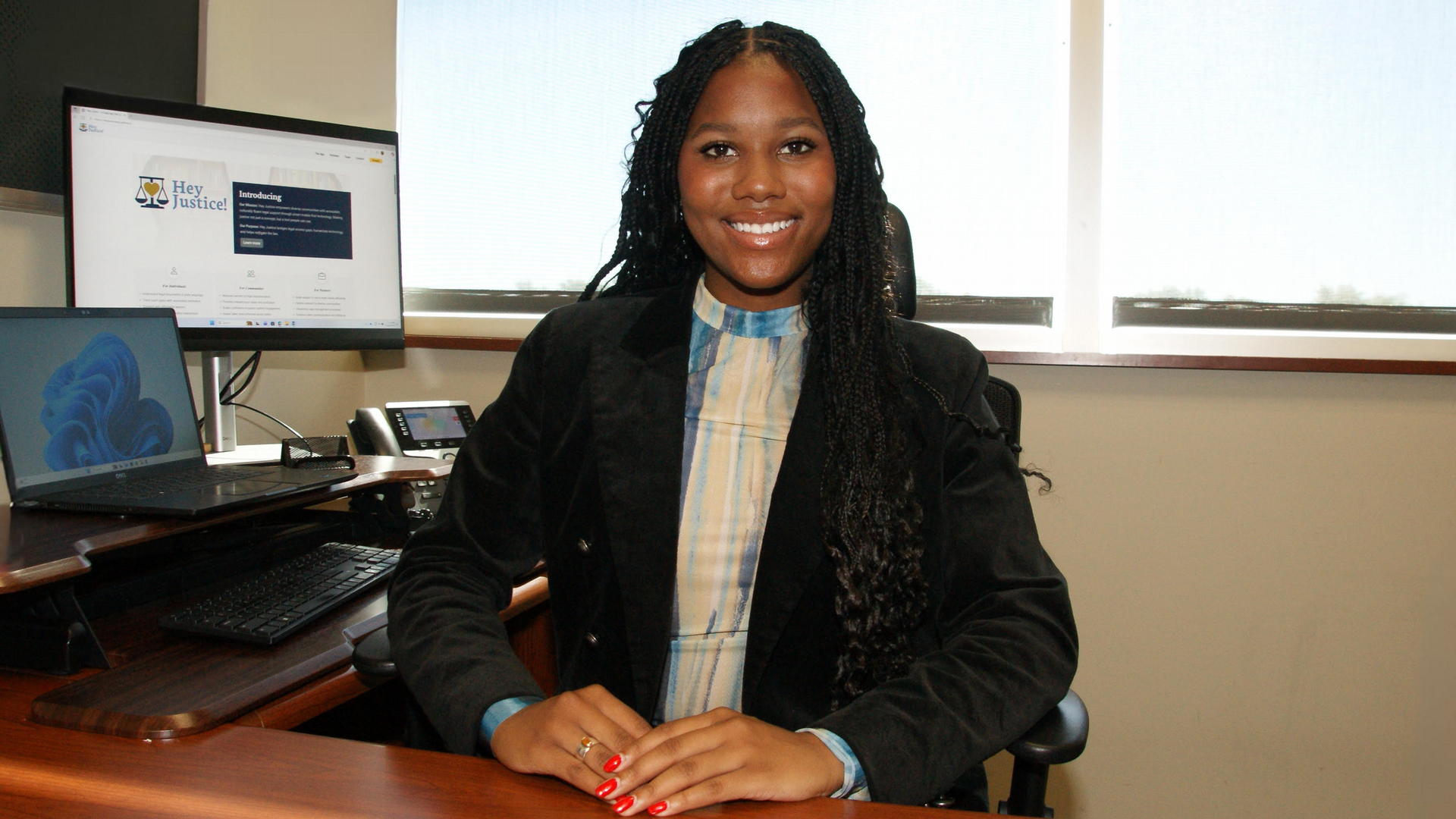 NC A&T student demos Hey Justice app to supporters