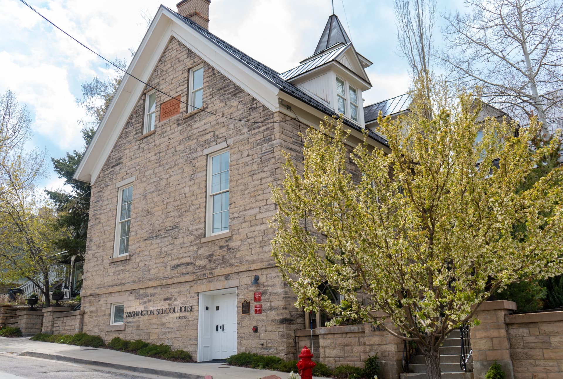 Old Town boutique hotel hits market, 2034 Olympics boost pitch