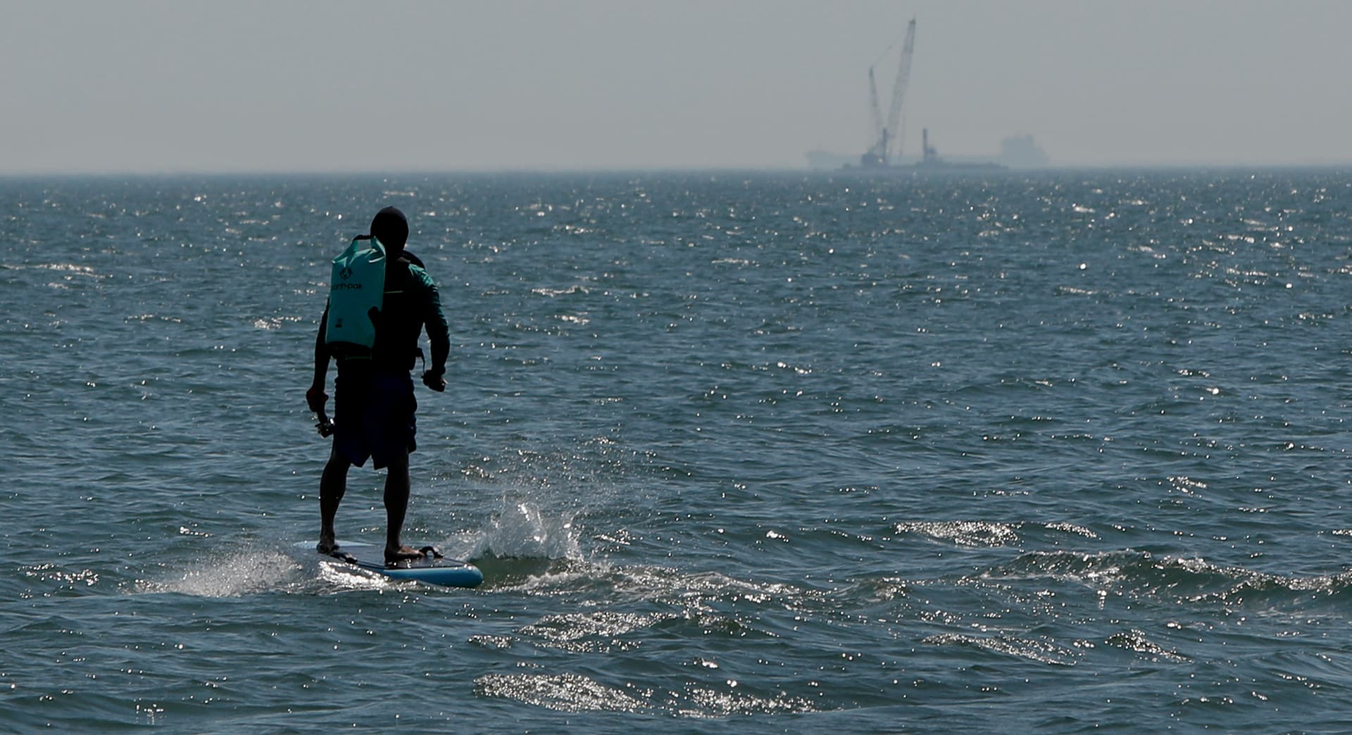 Hampton eFoil riders raise thousands for food bank with 19-mile bay crossing