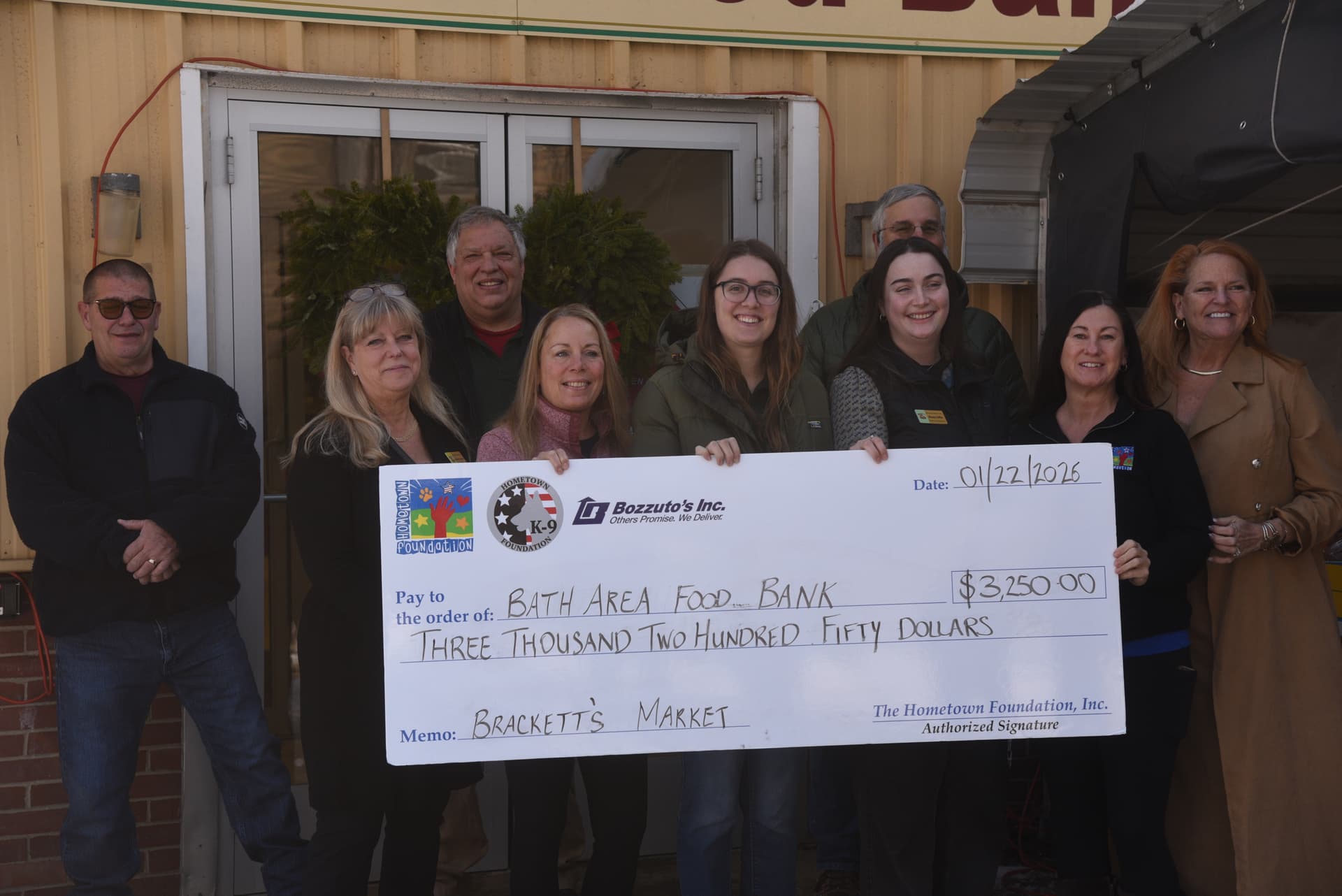 Brackett’s Market Gives $6,300, 40 Turkeys as Bath Food Bank Demand Surges